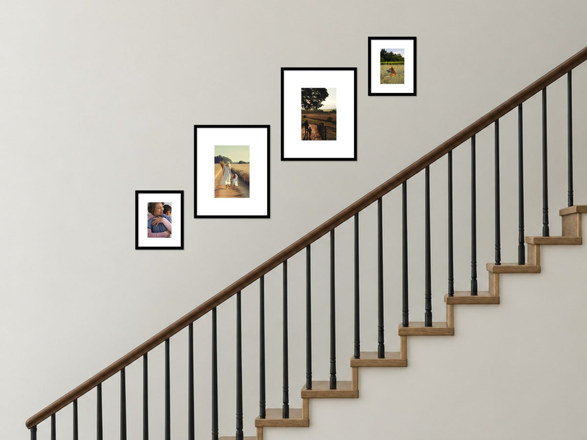 The Alnwick Stairwell Set in black, hung up a staircase